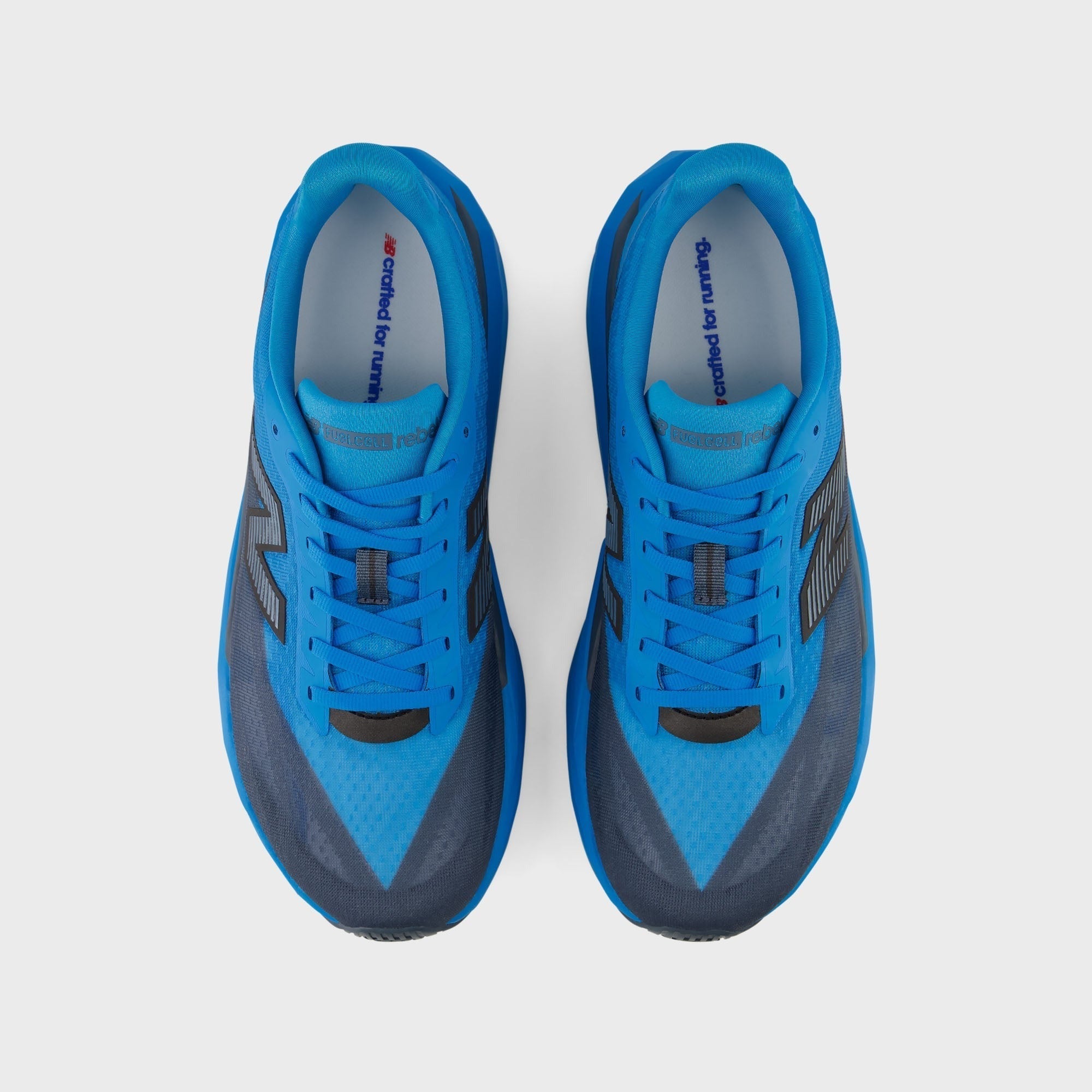 New Balance FuelCell Rebel v5 - Altitude / Shadow Blue
