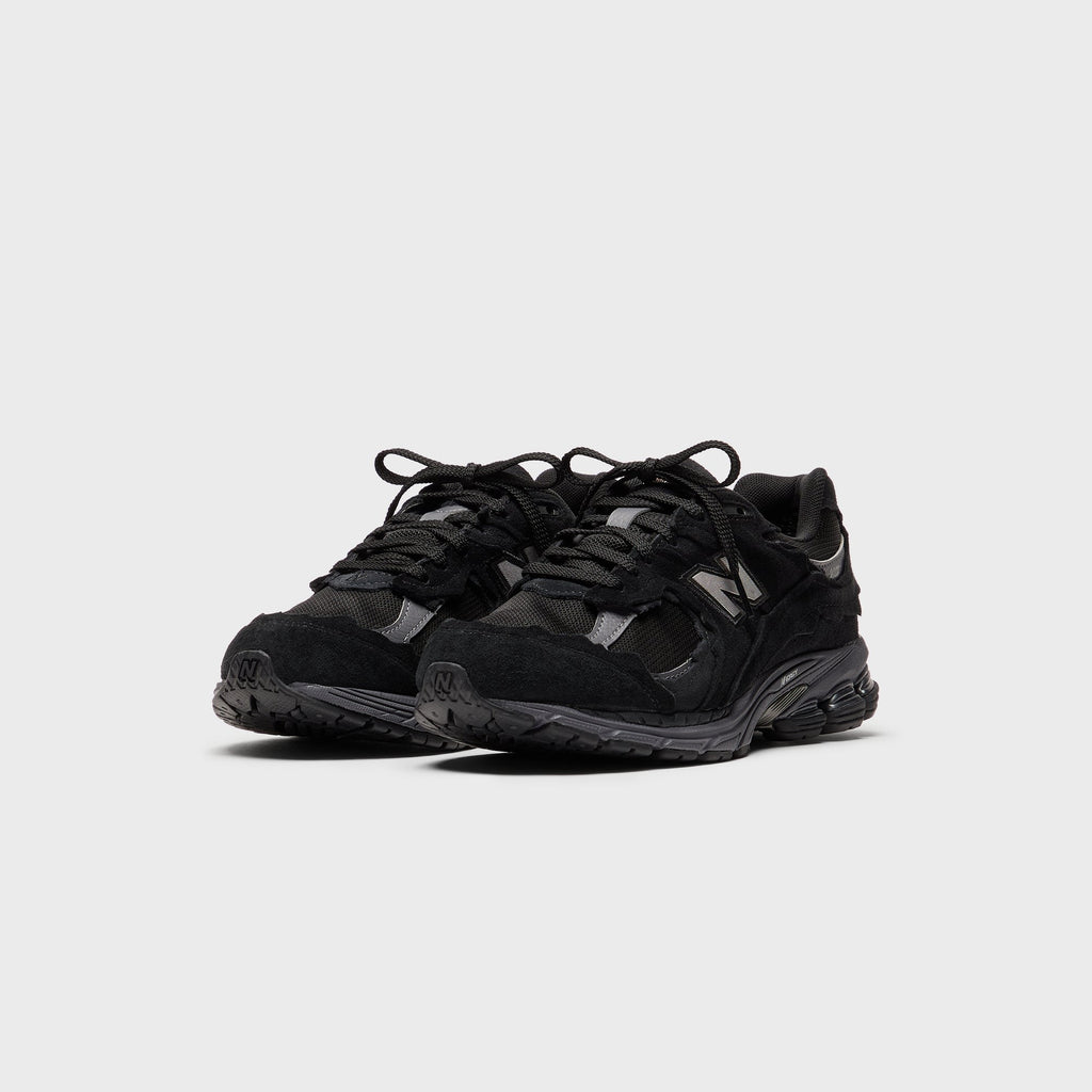 New Balance U2002DX - Black / Magnet