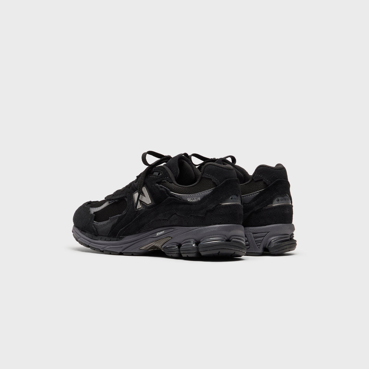 New Balance U2002DX - Black / Magnet