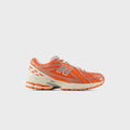 New Balance 1906R - Tangerine Heat / Stone Pink